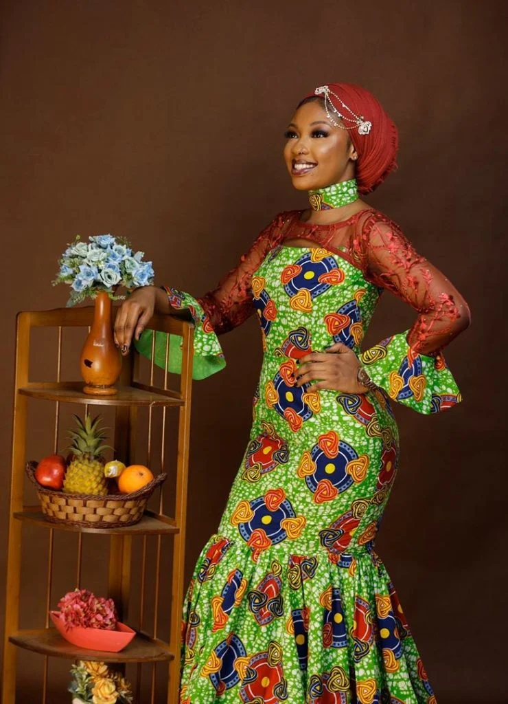 ladies posed in her African print Ghana dresses